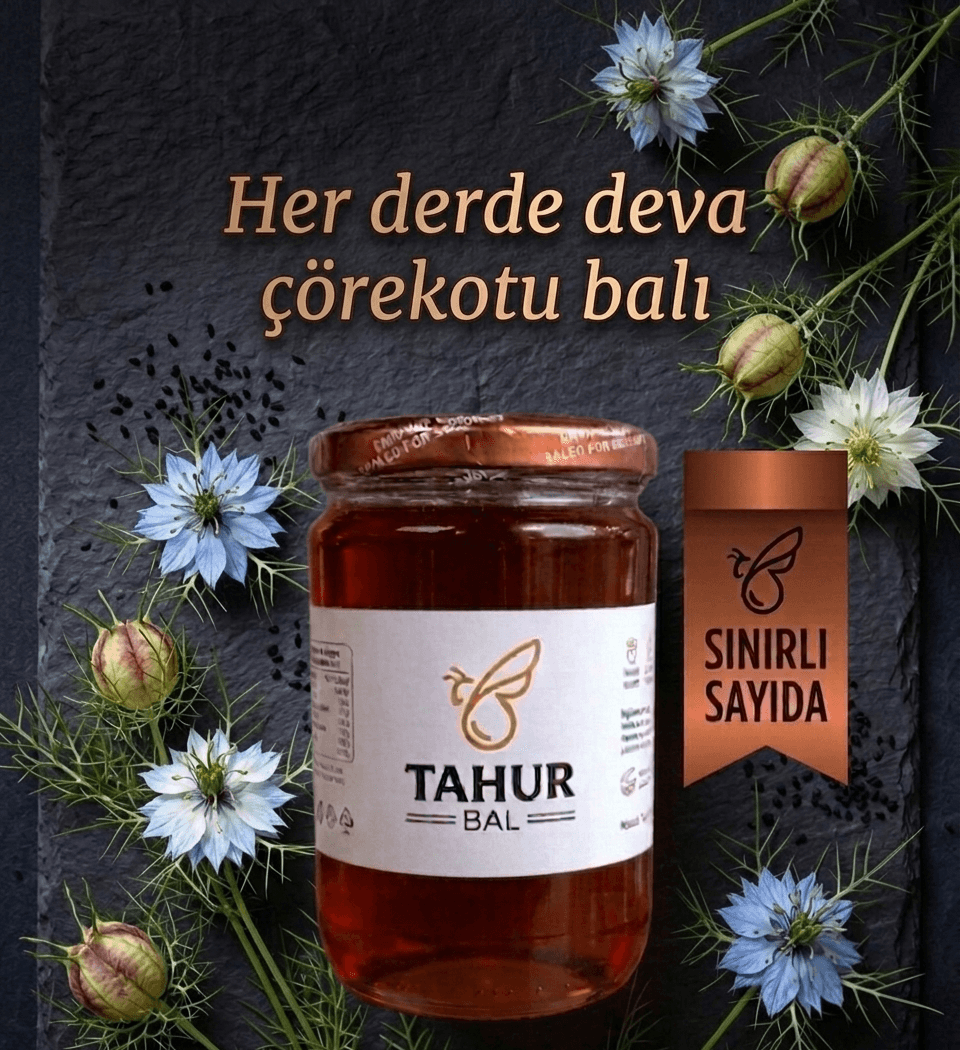 Kavanozda çörekotu balı ve yanında çörekotu tohumları